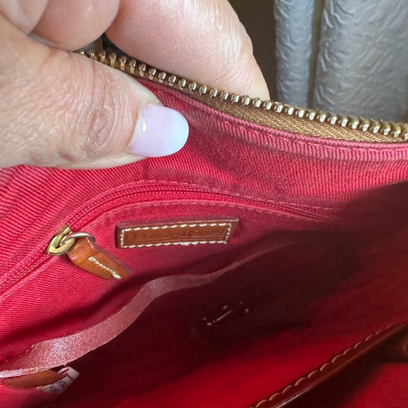 Dooney & Bourke Pebble Grain Crossbody Women's Bag in Marigold color. - Picture 5 of 8